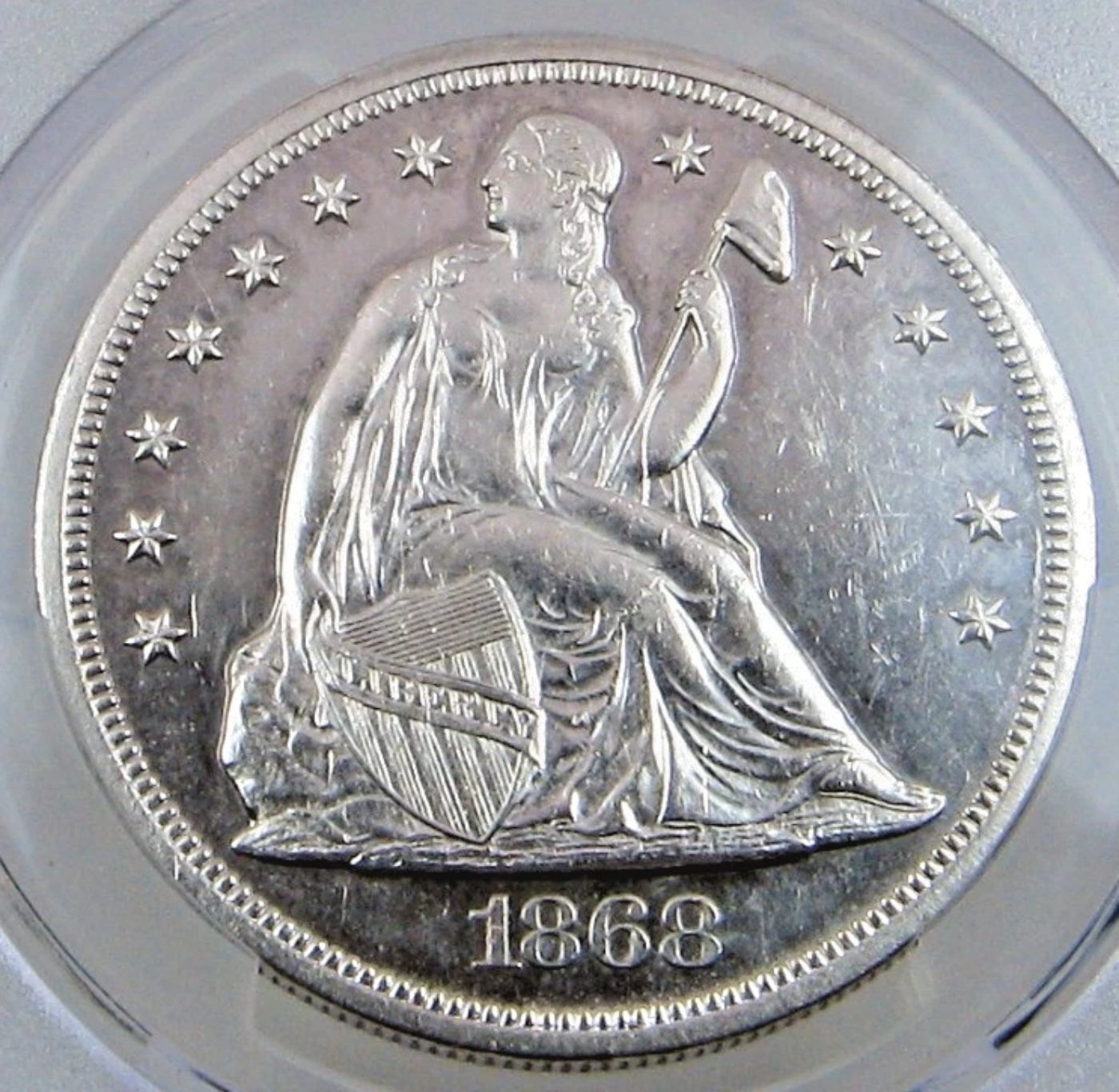 1868-Seated-Dollar-Thoughts-PCGS-AU-Detail